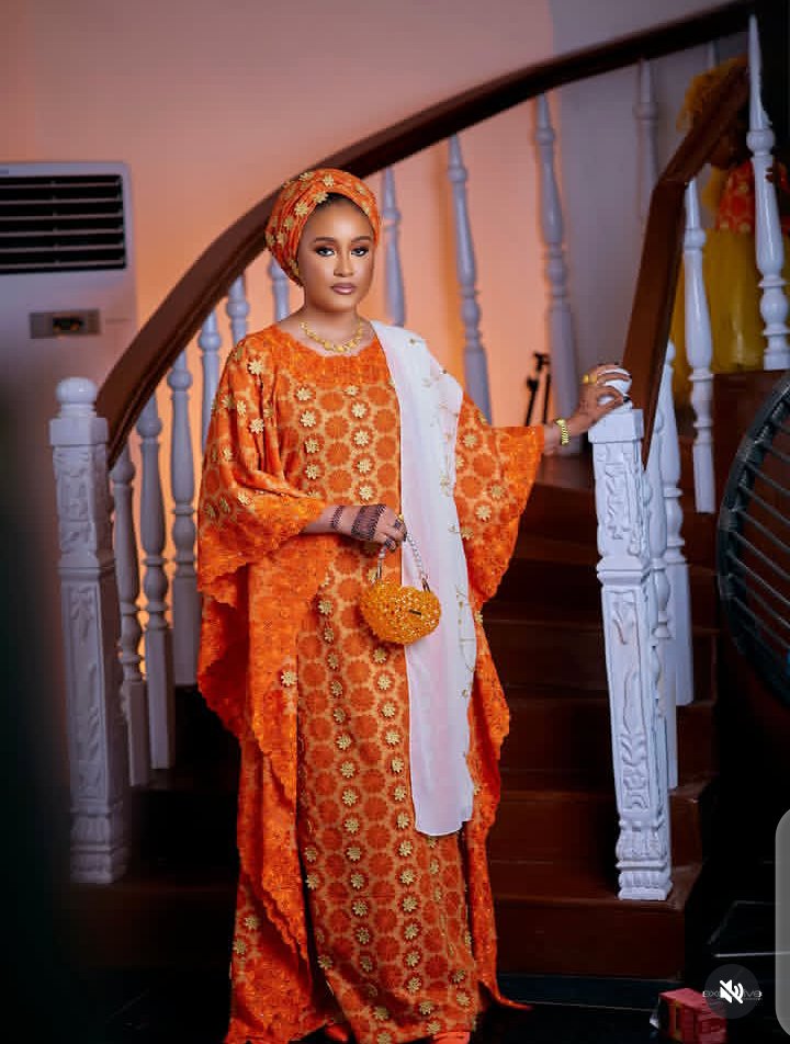 Mbs Glamour instructor in traditional orange lace styling