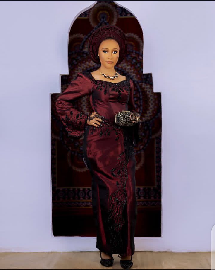 Mbs Glamour burgundy gele and makeup look